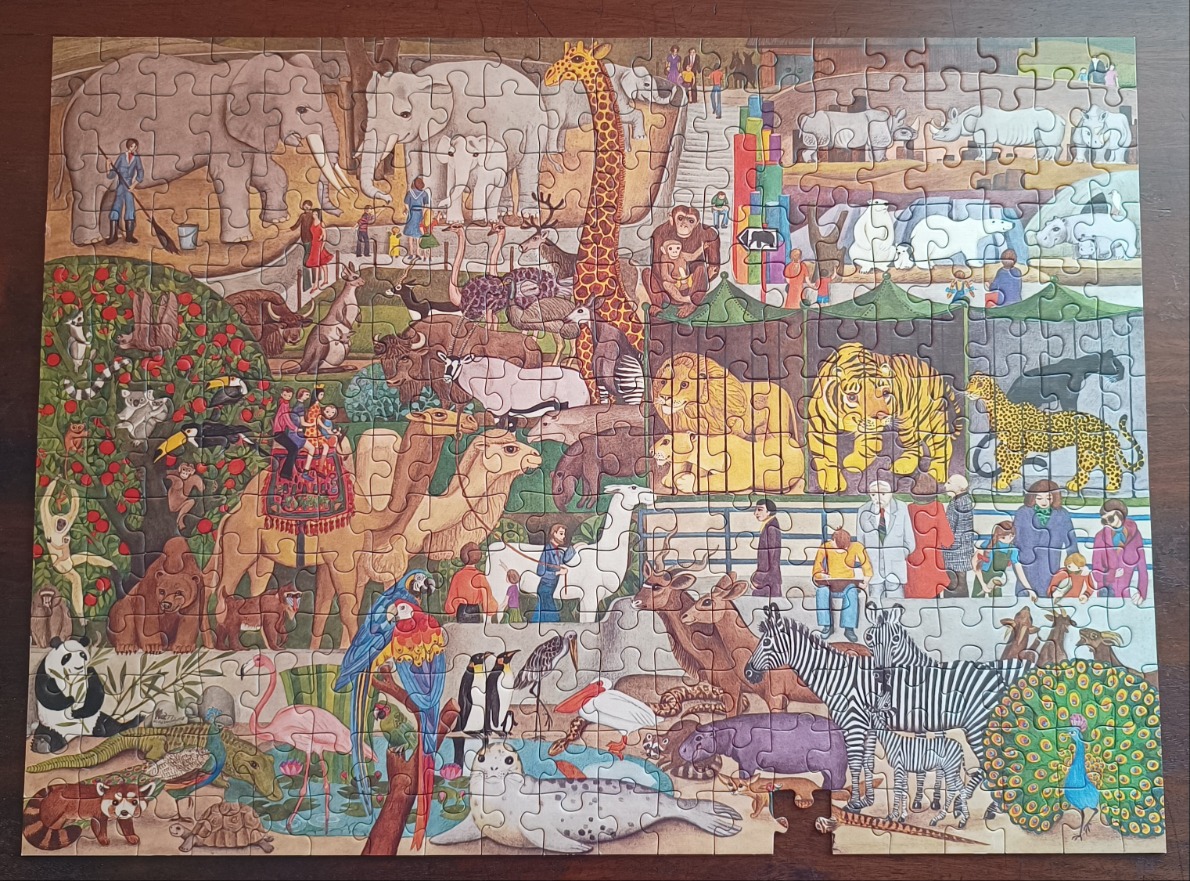 A crowded illustration of a zoo with various animals and visitors.