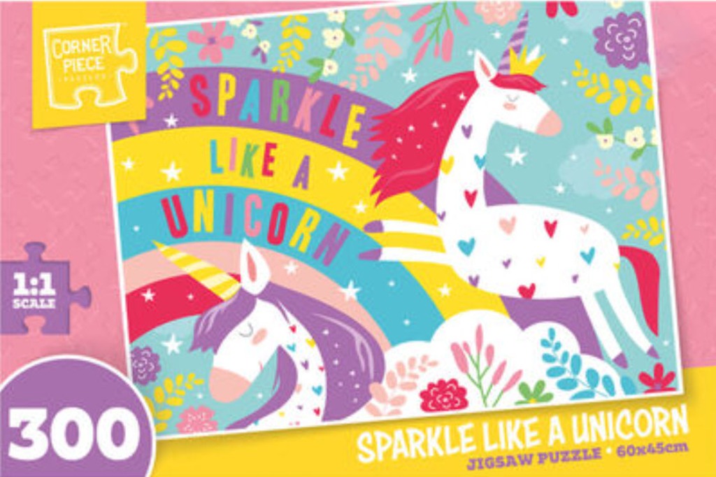 An illustration of two white unicorns, a rainbow, and flowers with the text Sparkle Like A Unicorn.