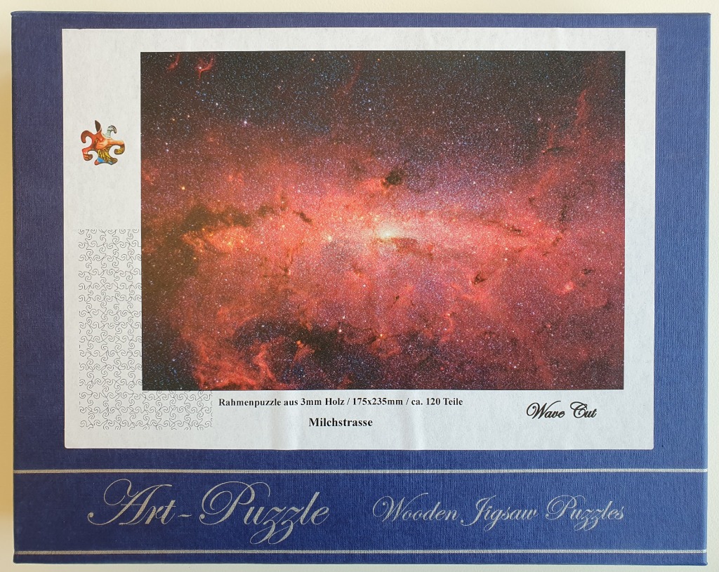 A deep space astrophotography image showing the vibrant red and purple nebulosity of the Milky Way galaxy.