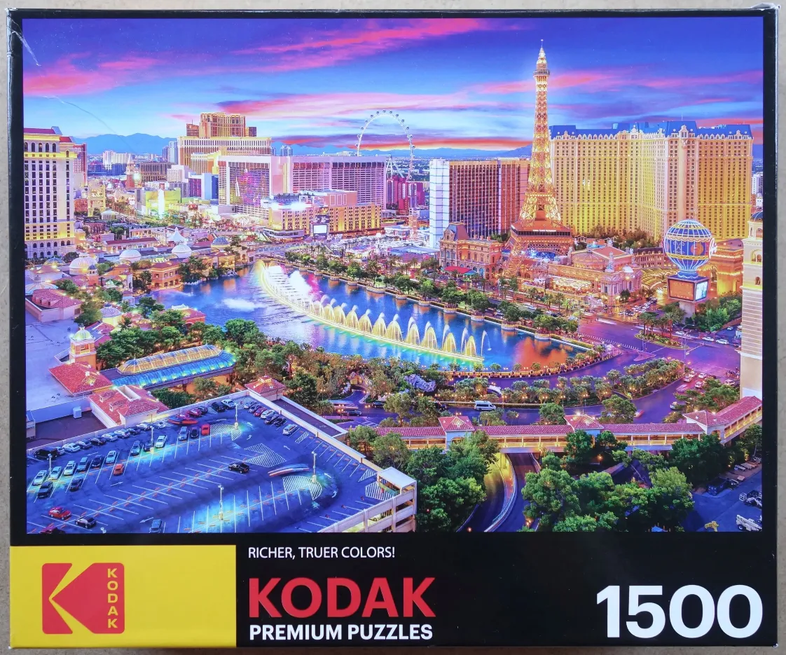 Panoramic view of the Las Vegas Strip at sunset with the Bellagio fountains in the foreground