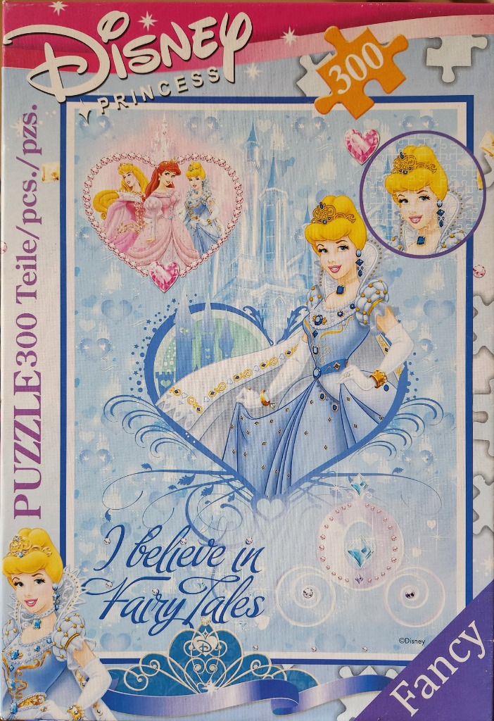 Illustration of Cinderella and other Disney princesses in a blue-themed heart-shaped design