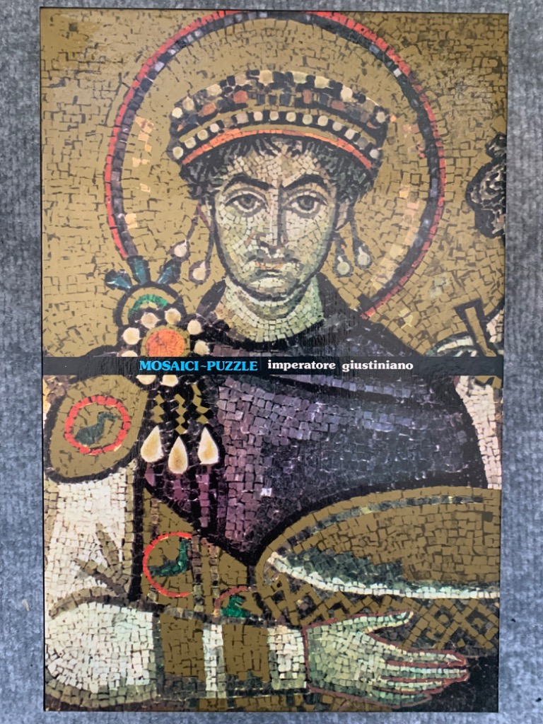 Byzantine mosaic portrait of Emperor Justinian I with a golden halo and ornate crown.
