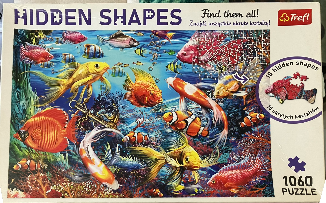 An underwater illustration filled with diverse tropical fish, coral reefs, and bubbles in a vibrant blue ocean setting.