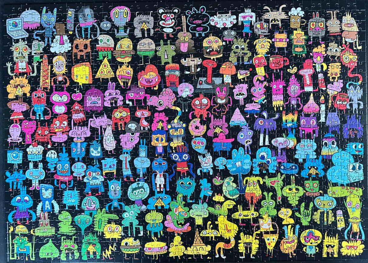 A collection of whimsical, colorful cartoon monsters arranged on a solid black background.