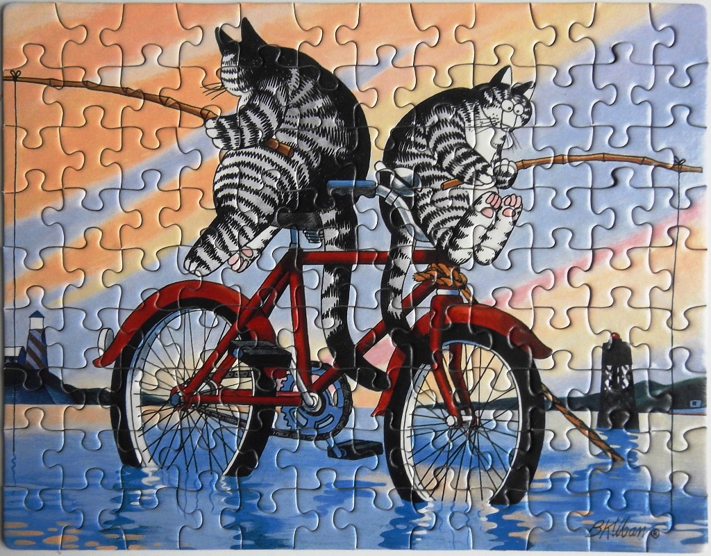 Two cartoon tabby cats fishing while perched on a red bicycle at the water's edge