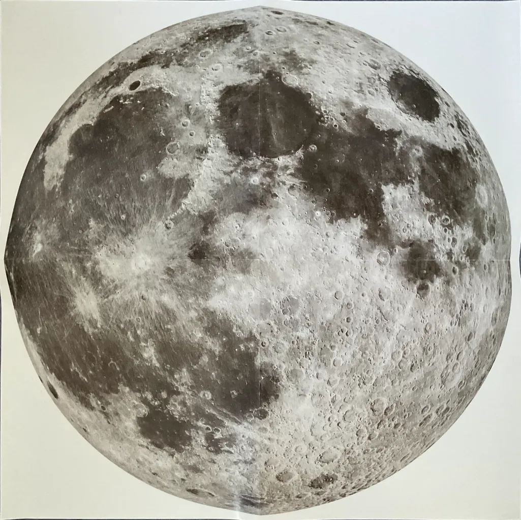 A detailed photographic view of the full moon set against a plain white background.