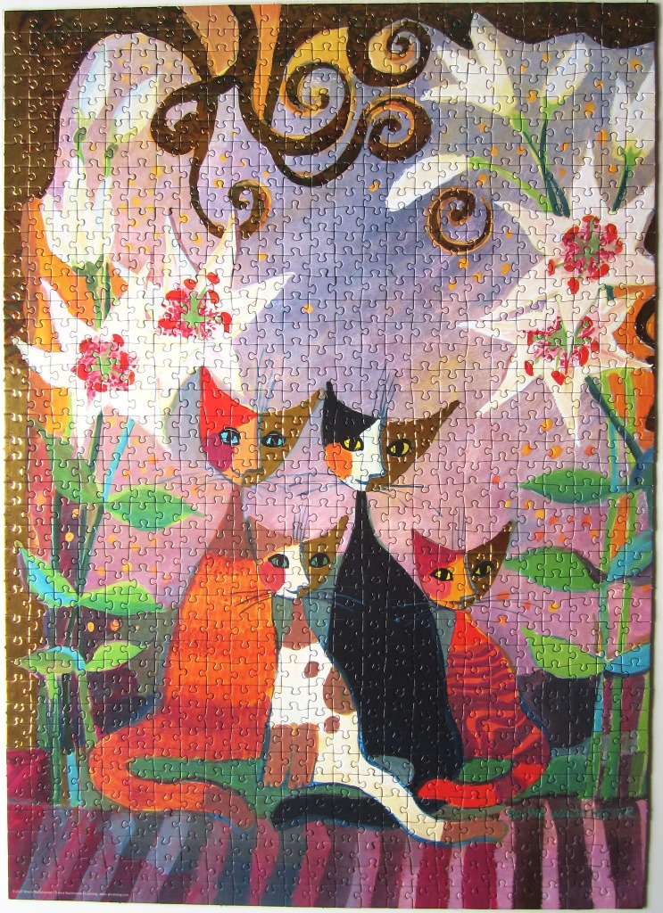 Stylized illustration of four colorful cats sitting amidst white lilies with dark, decorative scrollwork.