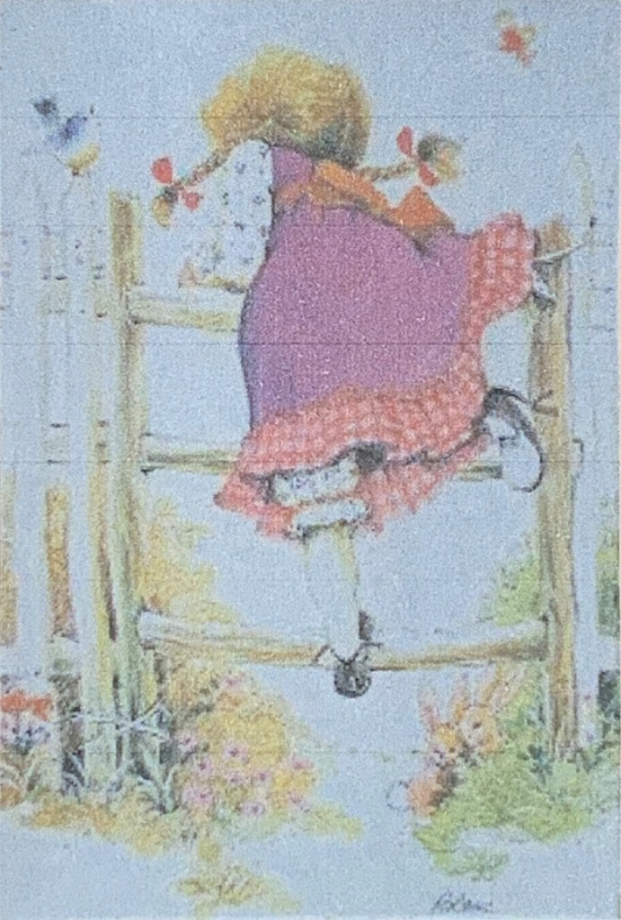 A young girl with blonde braids climbing over a rustic wooden fence in a garden setting.