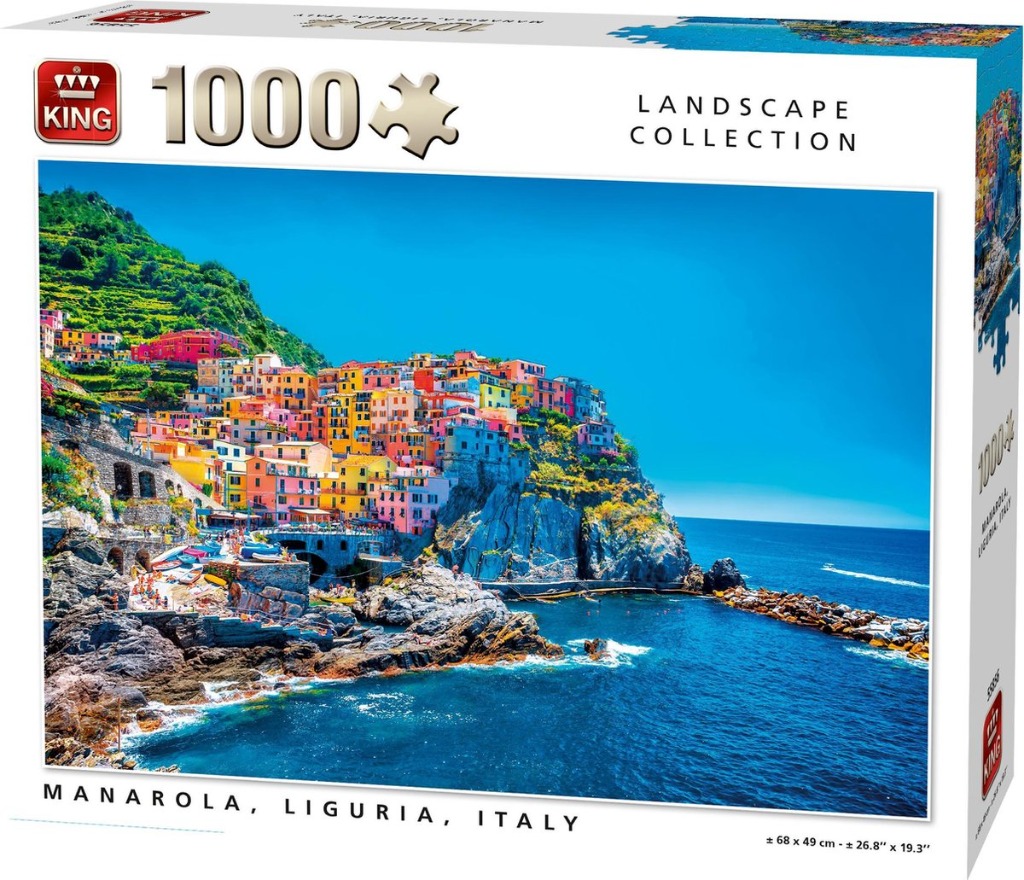 A panoramic photograph of the colorful hillside village of Manarola in Liguria, Italy, overlooking the sea.