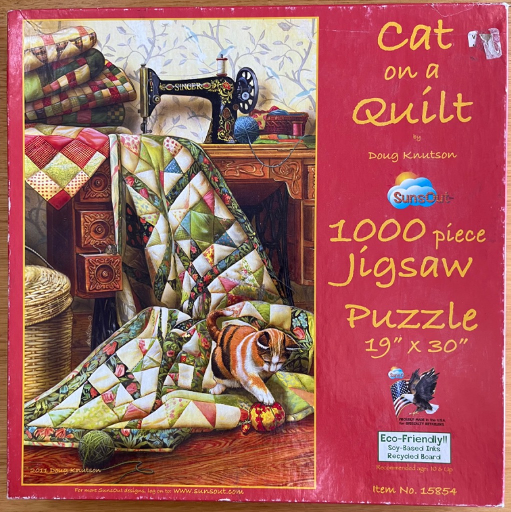 An illustration of a calico cat playing with a pincushion on a patchwork quilt near a vintage sewing machine.
