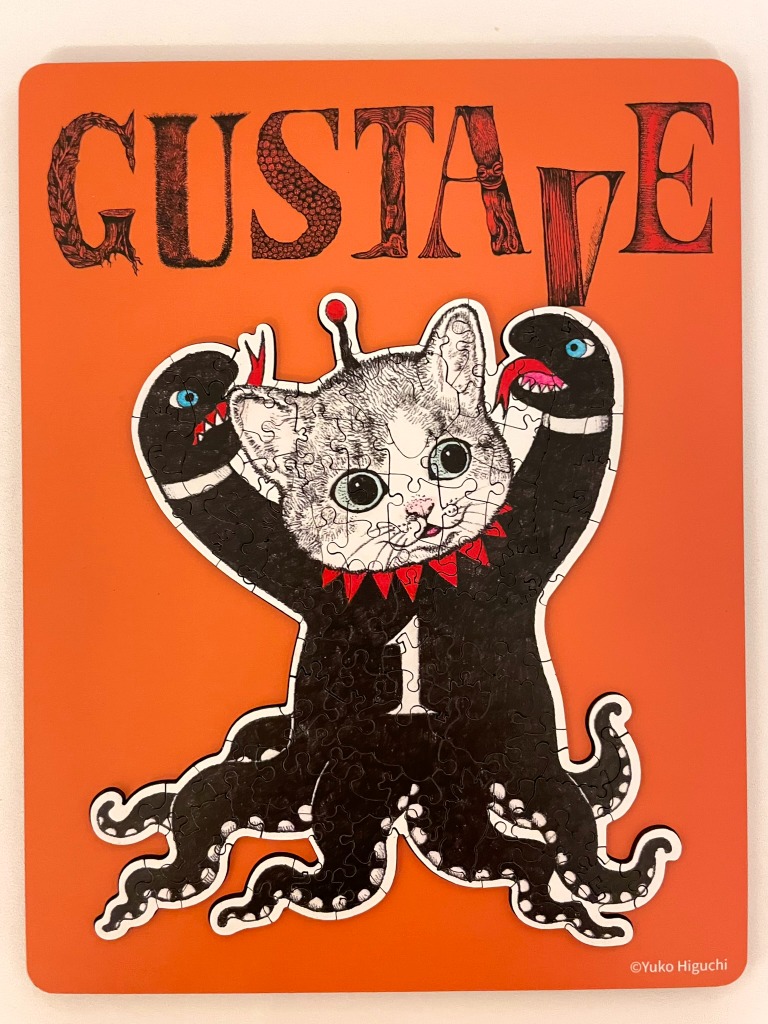 Surreal illustration of a cat-octopus hybrid character named Gustave against an orange background.