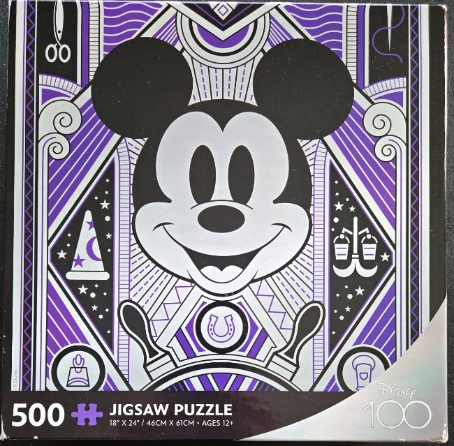 Art Deco style illustration of Mickey Mouse surrounded by stylized icons in purple, black, and white.