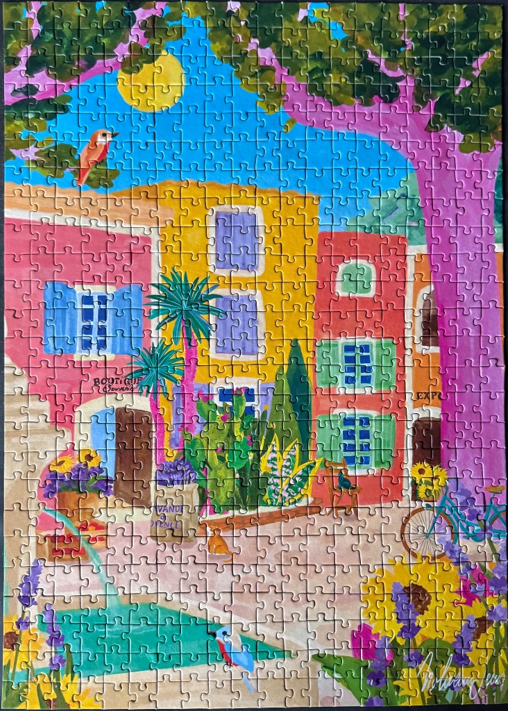 A vibrant, painterly scene of a Mediterranean street with colorful buildings, lush foliage, and a bright yellow sun.