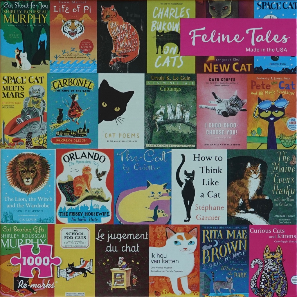 A collage of various book covers featuring cats in a grid pattern.