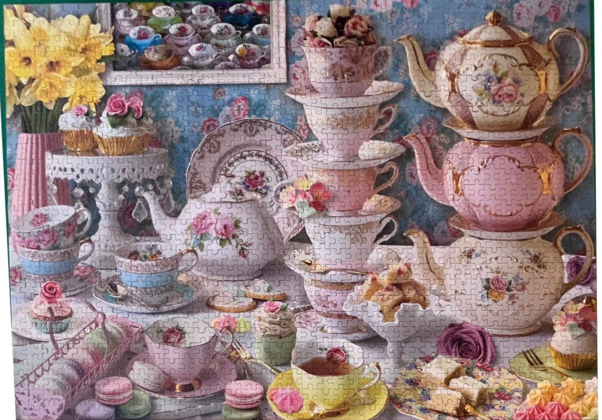 A whimsical tea party scene featuring stacks of vintage floral teacups, ornate teapots, and sweet treats.