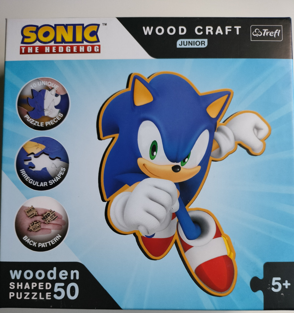 Sonic the Hedgehog character illustration on a light blue background.