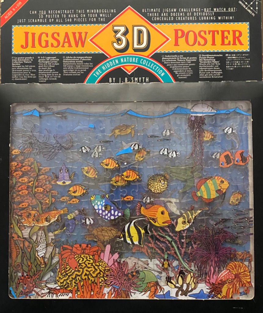 A vibrant, crowded underwater coral reef scene filled with many different colorful fish and sea creatures.