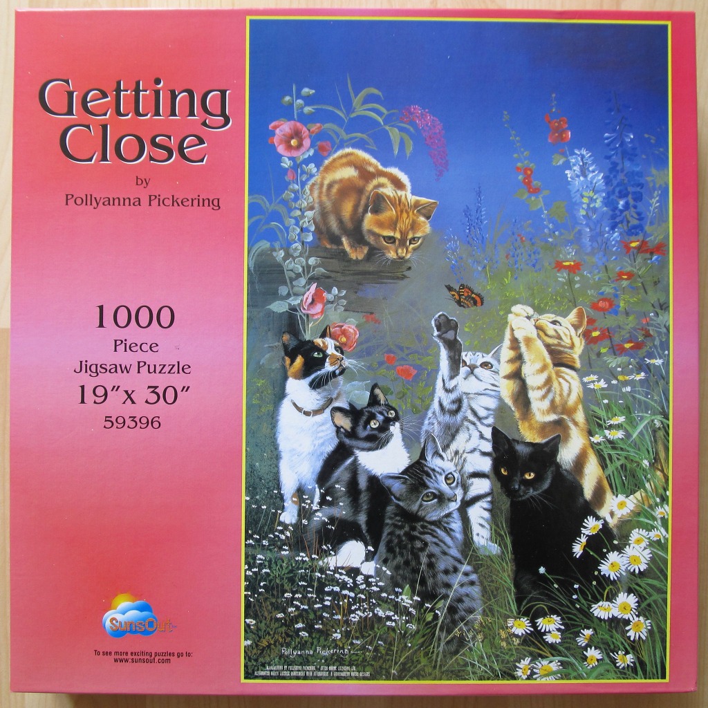 An illustration of six cats of various colors and patterns playing in a lush, blooming garden.