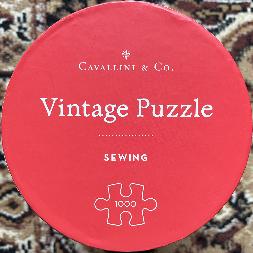 Red circular box with "Vintage Puzzle SEWING" text and a puzzle piece icon.
