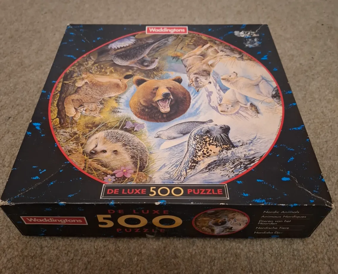 An illustration featuring a collection of northern wild animals arranged in a circle.