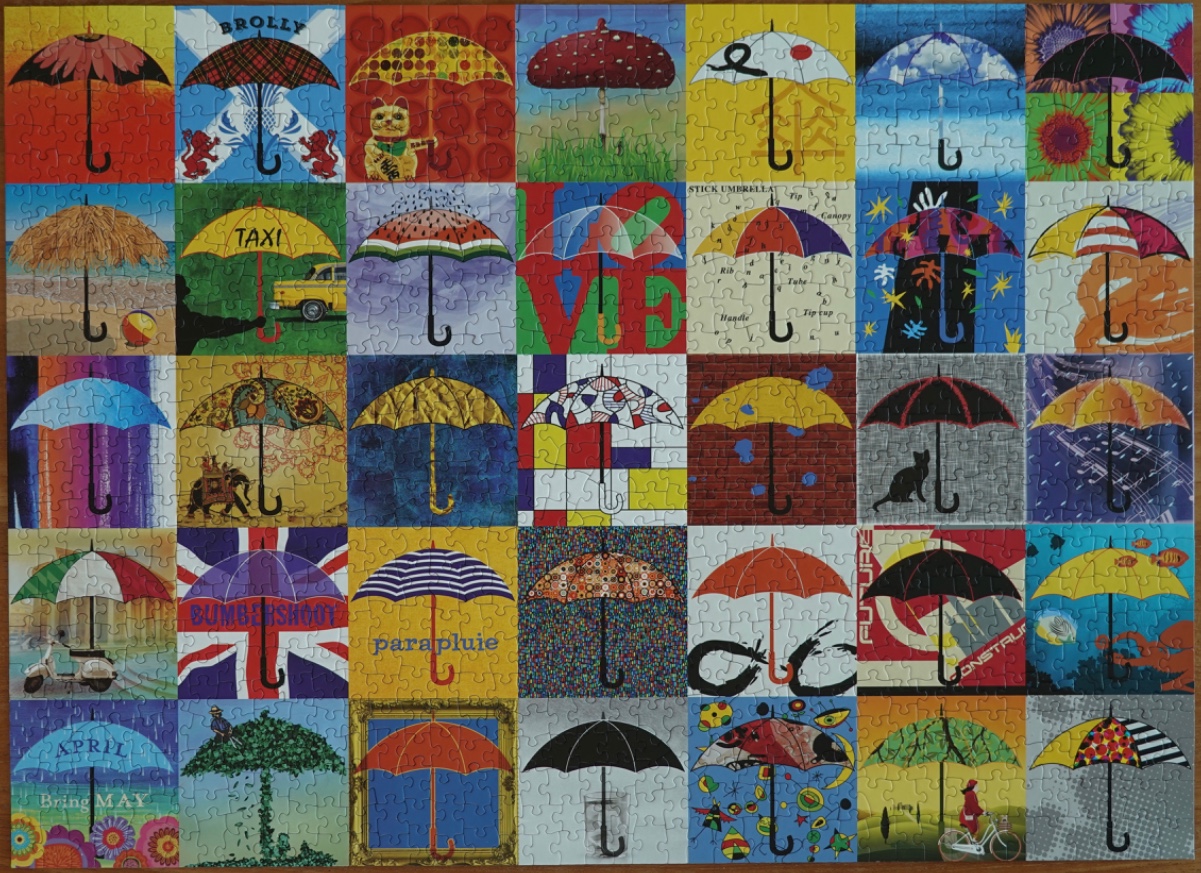 A collage of 35 diverse artistic squares each featuring a unique umbrella design.