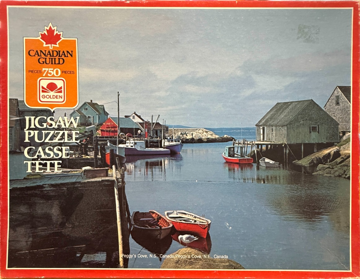 A peaceful photograph of Peggy's Cove, Nova Scotia, featuring fishing boats, weathered wooden buildings, and the harbor.