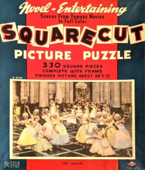 A vintage film still featuring a group of women in 18th-century style ballgowns dancing in a grand palace ballroom.
