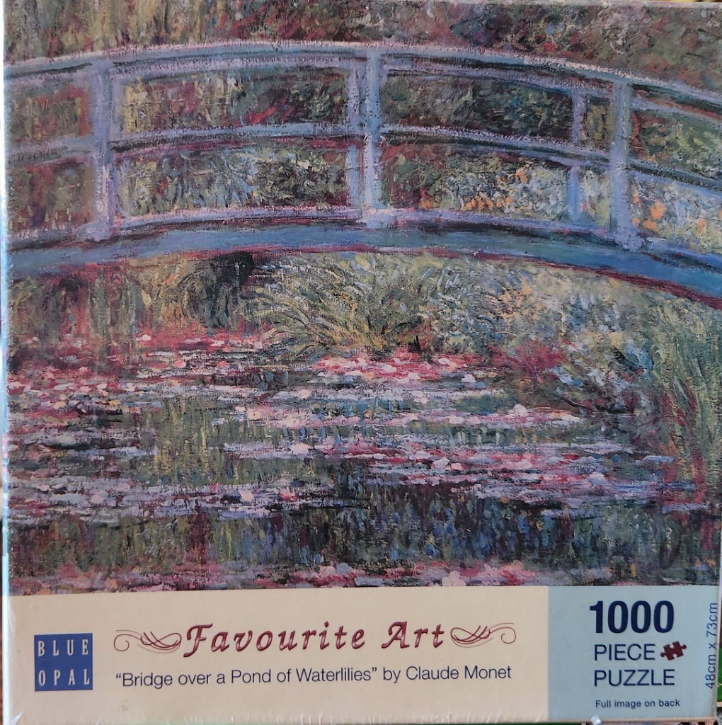 Impressionist painting of a green footbridge arching over a pond filled with blooming water lilies.
