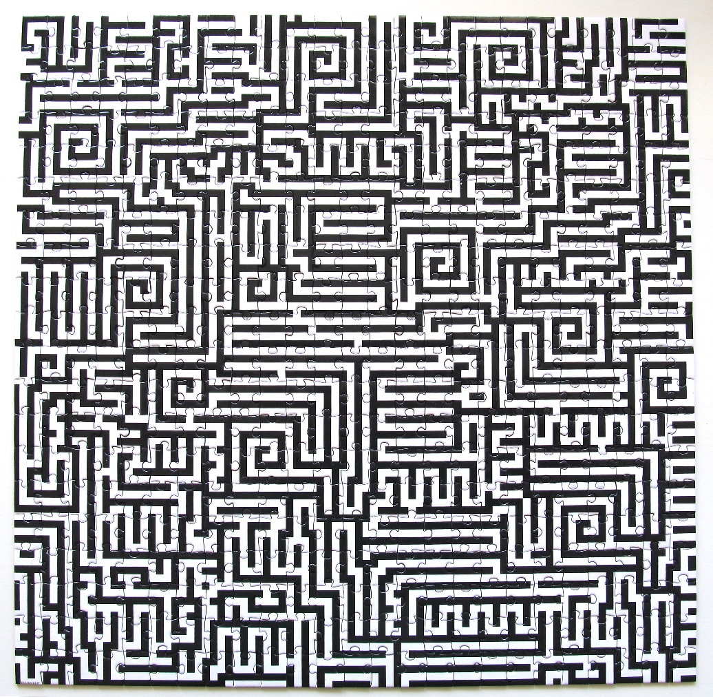 A square black and white maze pattern with interconnected paths.