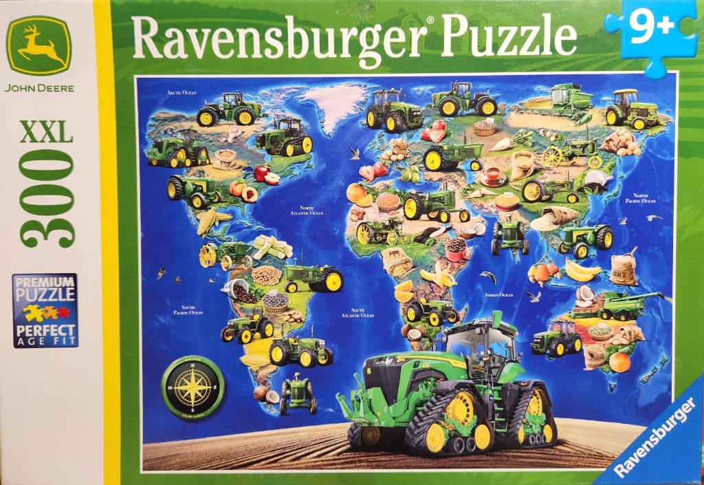 A stylized world map featuring various green tractors and agricultural produce scattered across the continents.