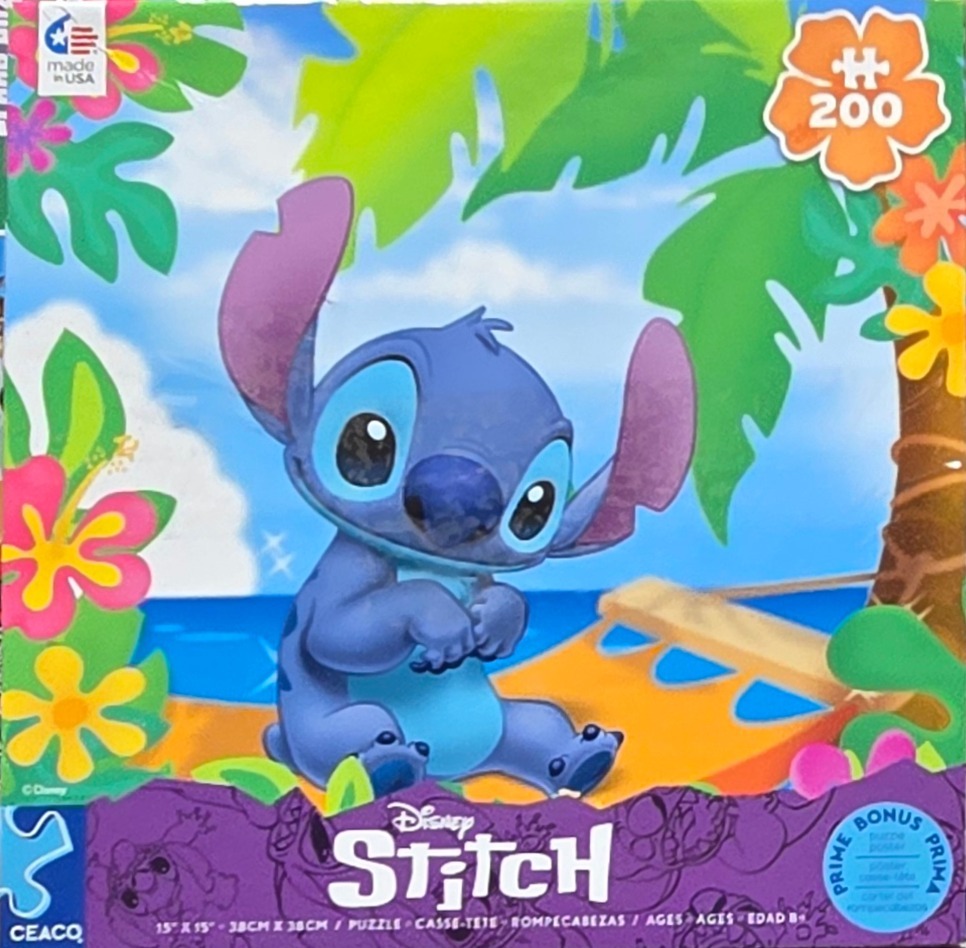 Stitch from Lilo & Stitch sitting on a beach in a tropical setting with hibiscus flowers.
