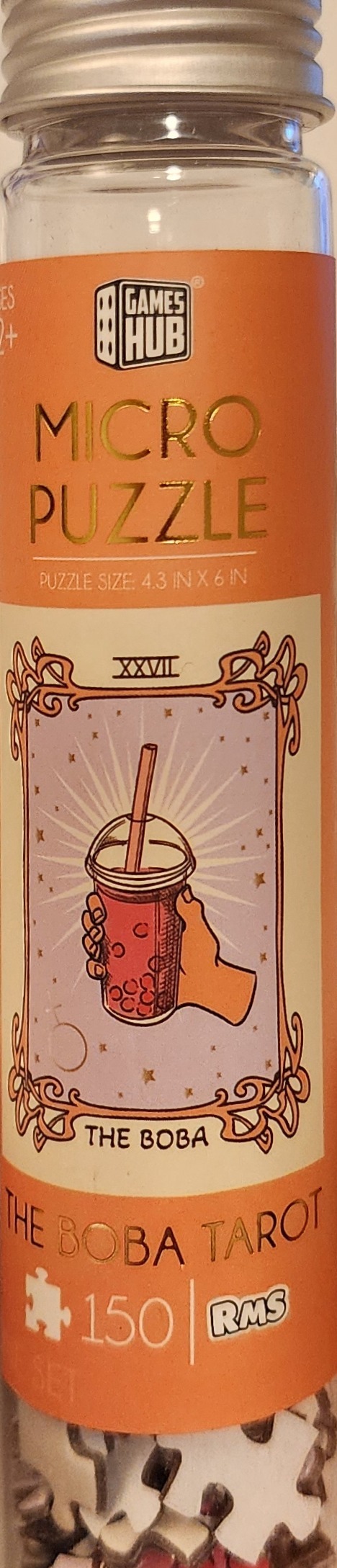 An illustration of a hand holding a boba tea cup styled as a tarot card titled The Boba.