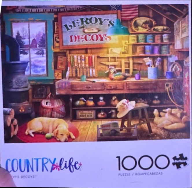 A cozy woodworking shop workshop scene with a yellow Labrador sleeping on a rug by a wood stove.