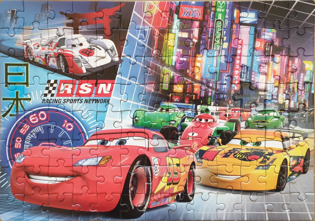 Animated race cars zooming through a vibrant Japanese-inspired city street at night.