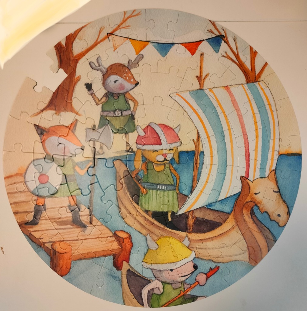 Watercolor-style illustration of anthropomorphic animals dressed as Vikings, including a fox on a dock and boats.