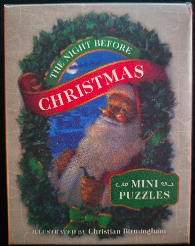 Illustration of Santa Claus framed by a Christmas wreath and the text The Night Before Christmas.