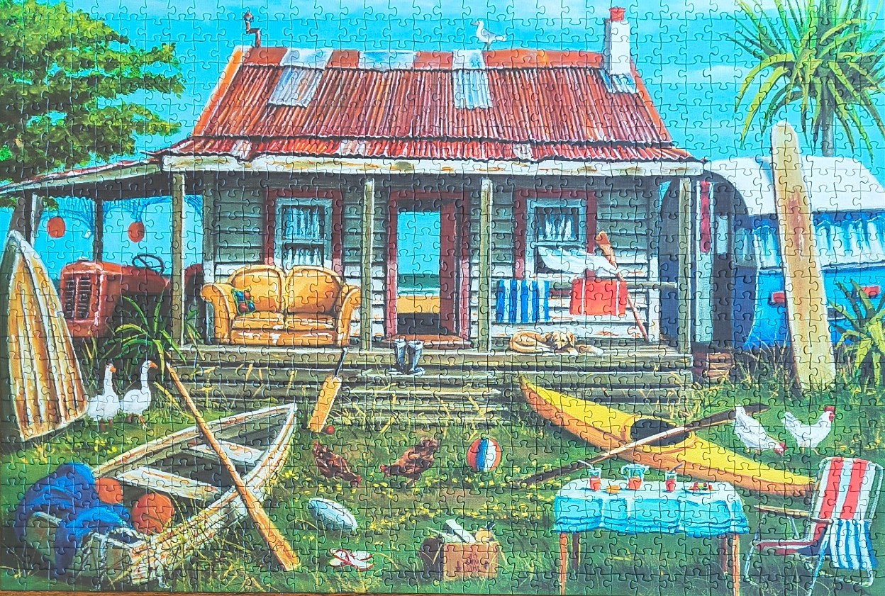 An illustration of a rustic beach shack with surfboards, a kayak, and farm animals in a cluttered yard.