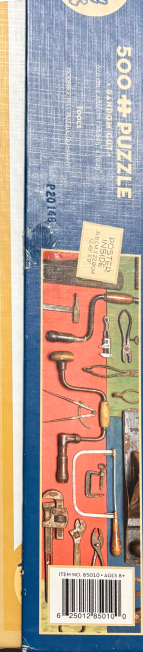 A collection of vintage hand tools arranged on a red and green background.