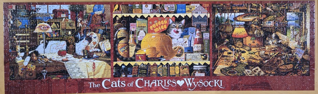 A panoramic illustration of cats in three distinct cozy indoor scenes, with the text The Cats of Charles Wysocki below.