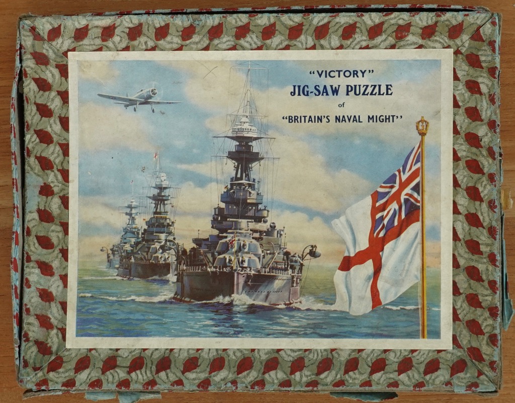 Painting of a line of British naval battleships at sea with a flying aircraft and a large white naval ensign flag.