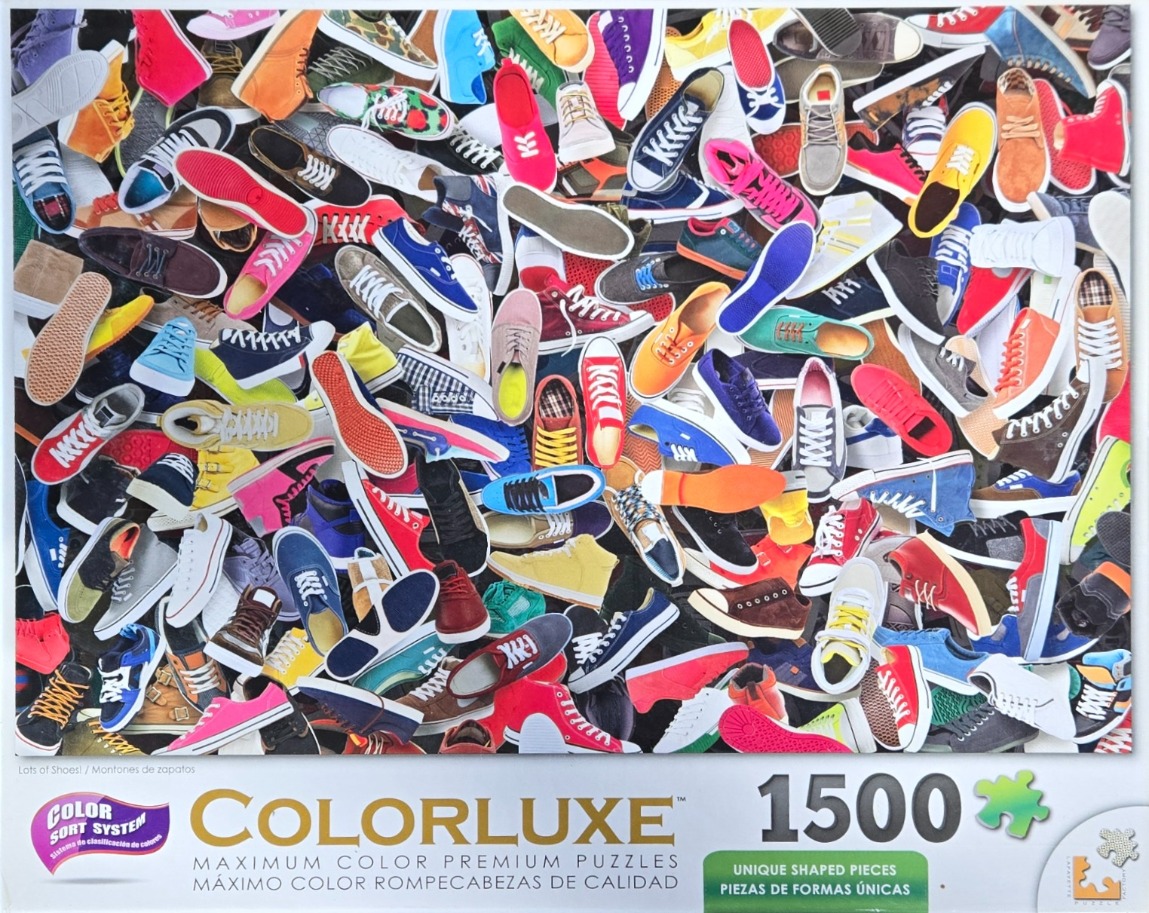 A dense, colorful collage of dozens of different canvas sneakers and casual shoes overlapping each other.