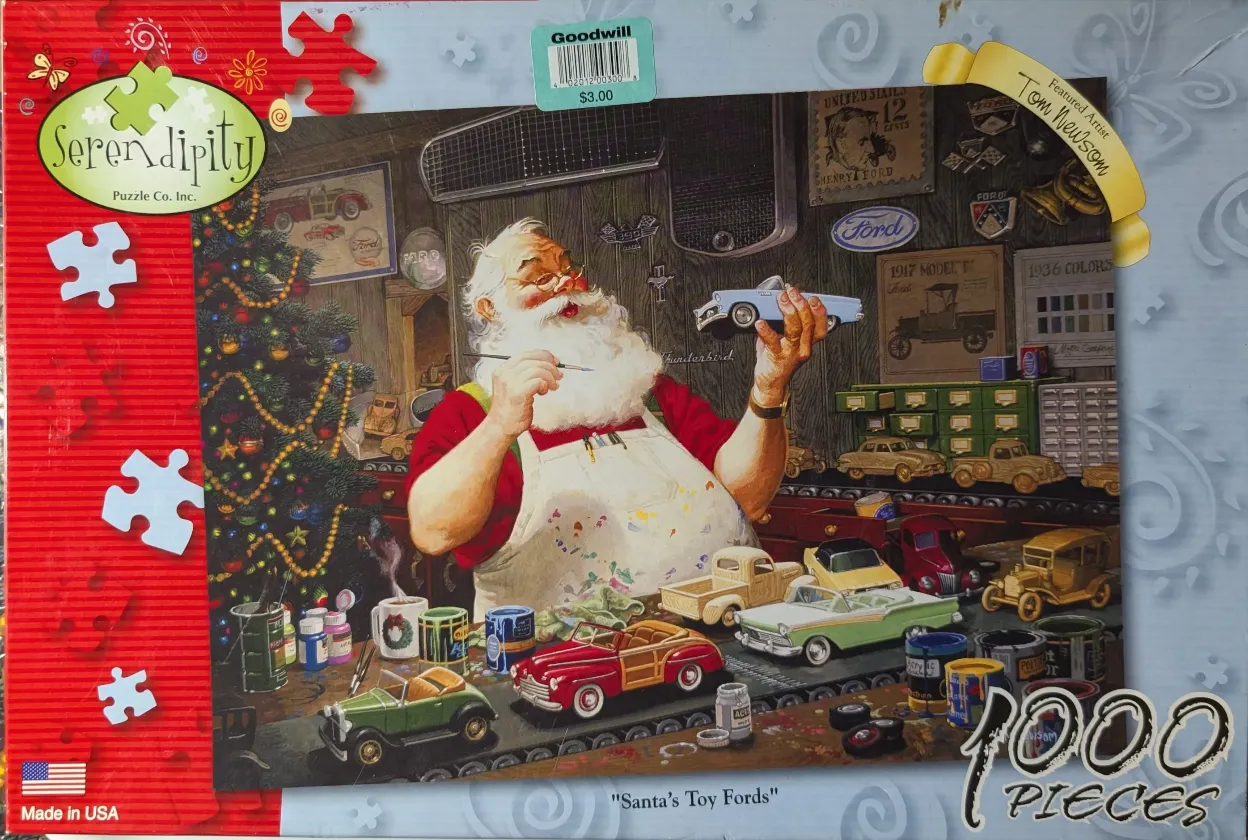 Painting of Santa Claus sitting at a workbench painting small vintage Ford toy cars in a festive workshop.