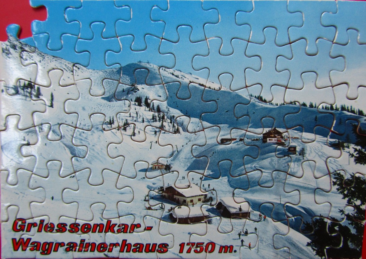 A snowy mountain landscape featuring the Griessenkar-Wagrainerhaus at 1750 meters altitude.