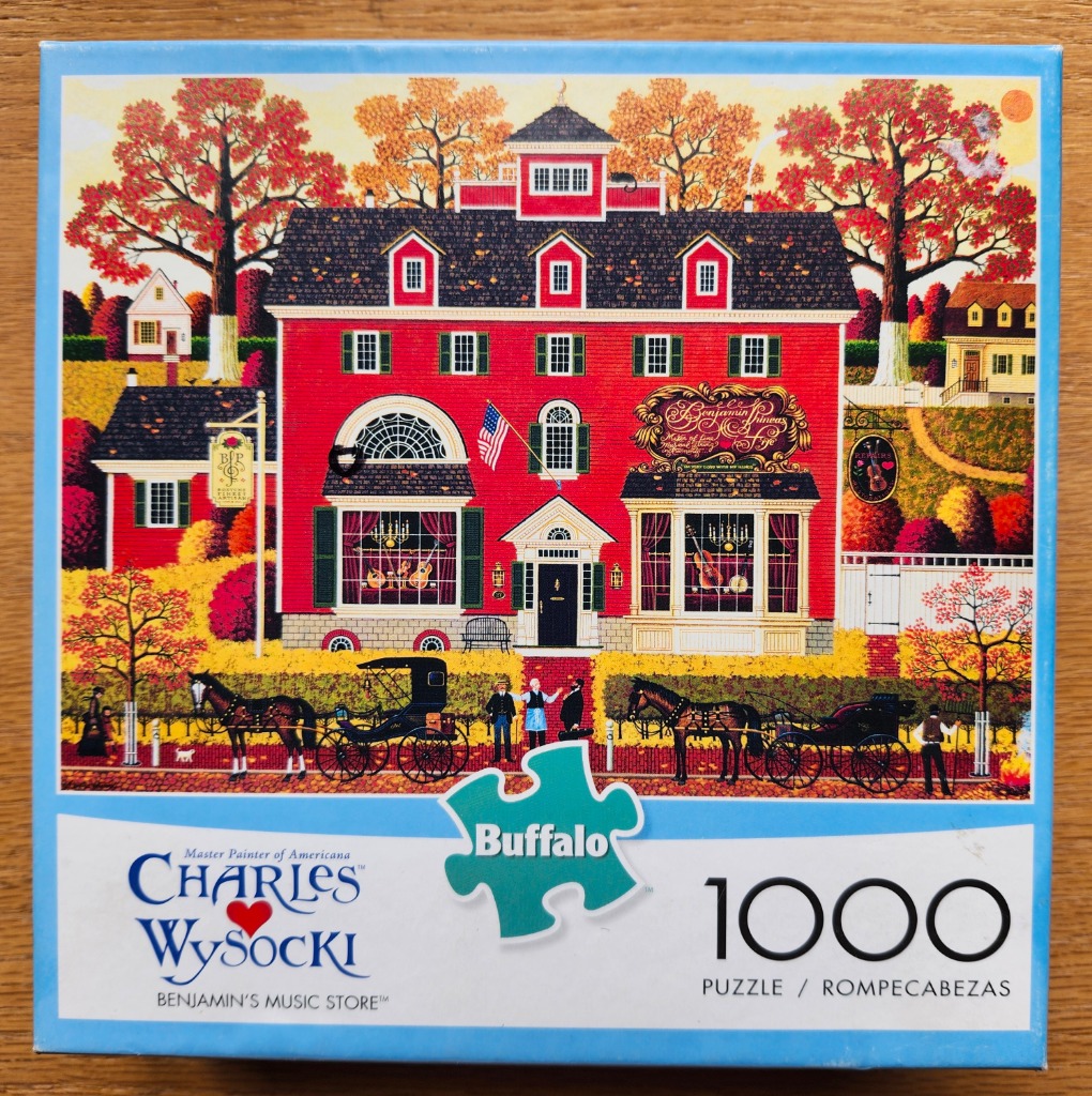 Folk art painting of a red music store, horse-drawn carriages, and autumn foliage in a colonial town setting.