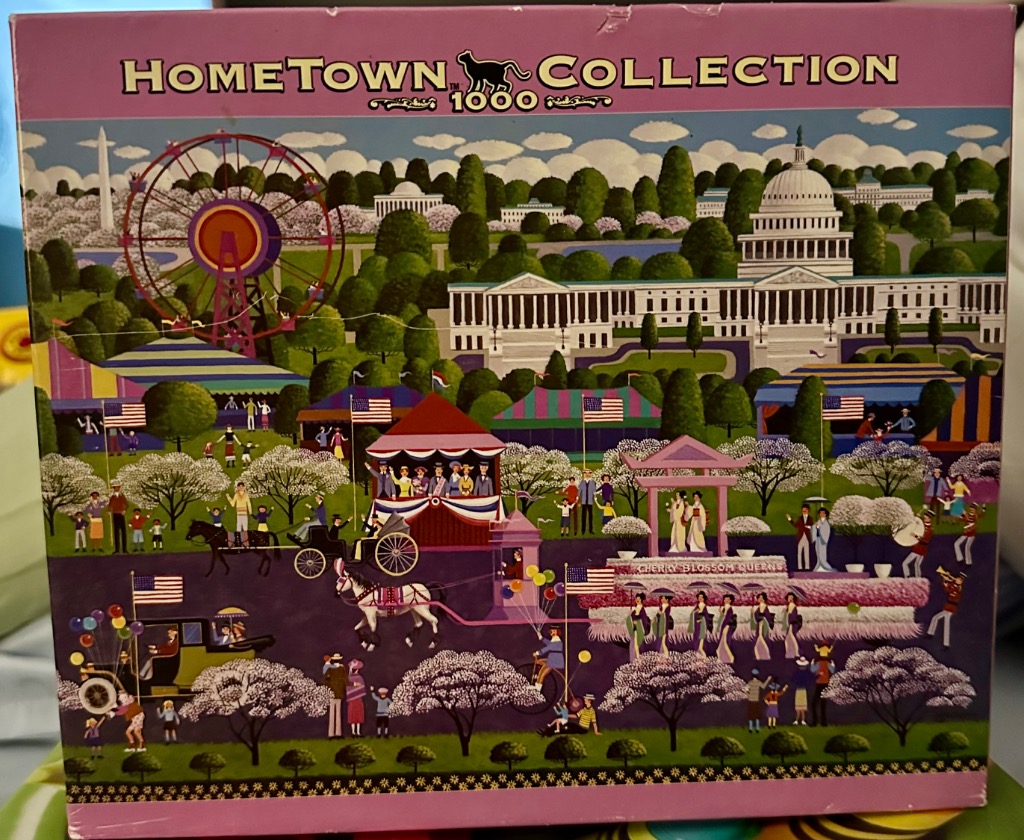 A festive Washington D.C. scene with a carnival, horse-drawn carriages, and cherry blossoms in a flat, folk-art style.