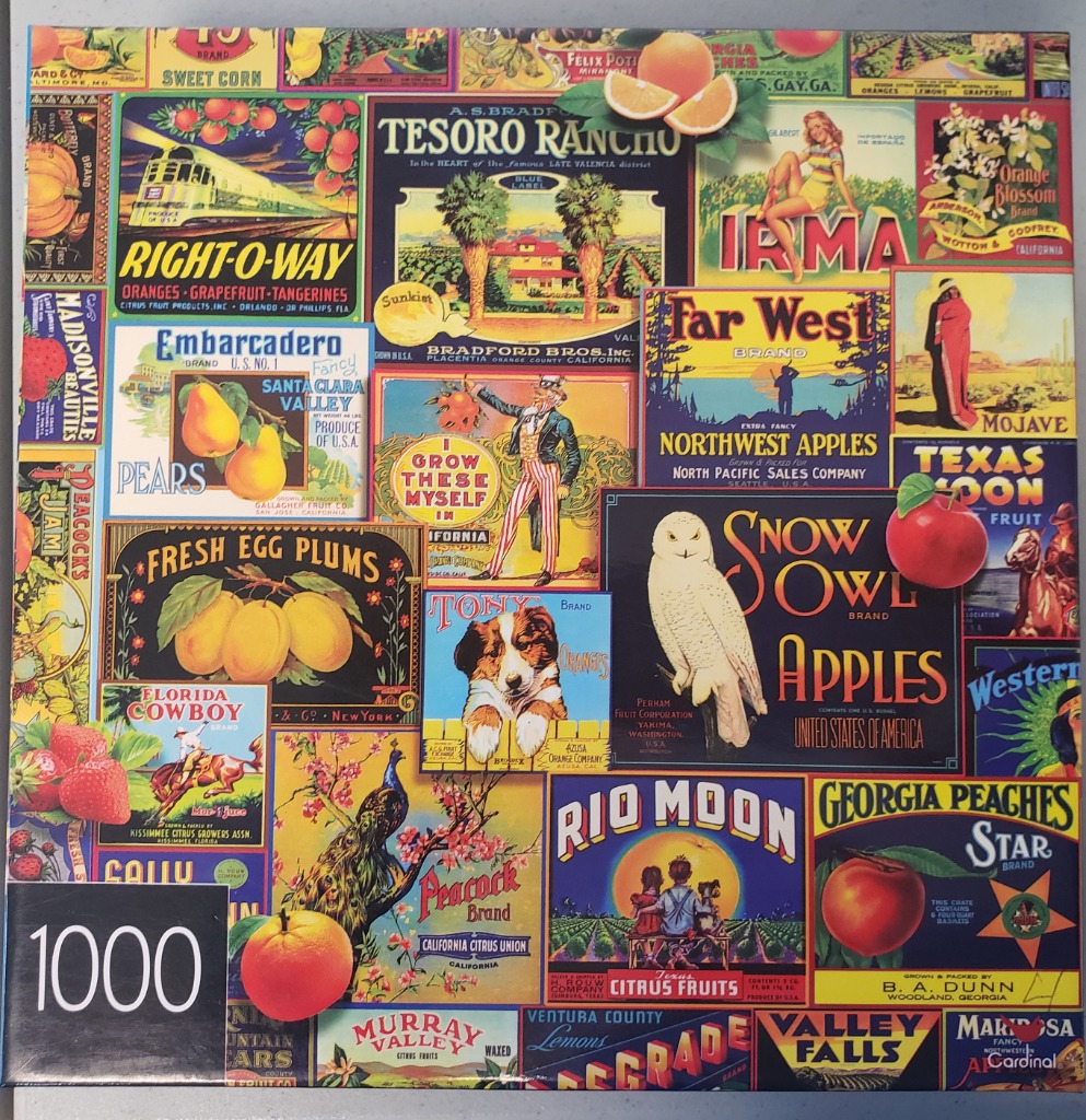 A collage of vintage fruit crate labels featuring diverse illustrations of produce, wildlife, and landscapes.