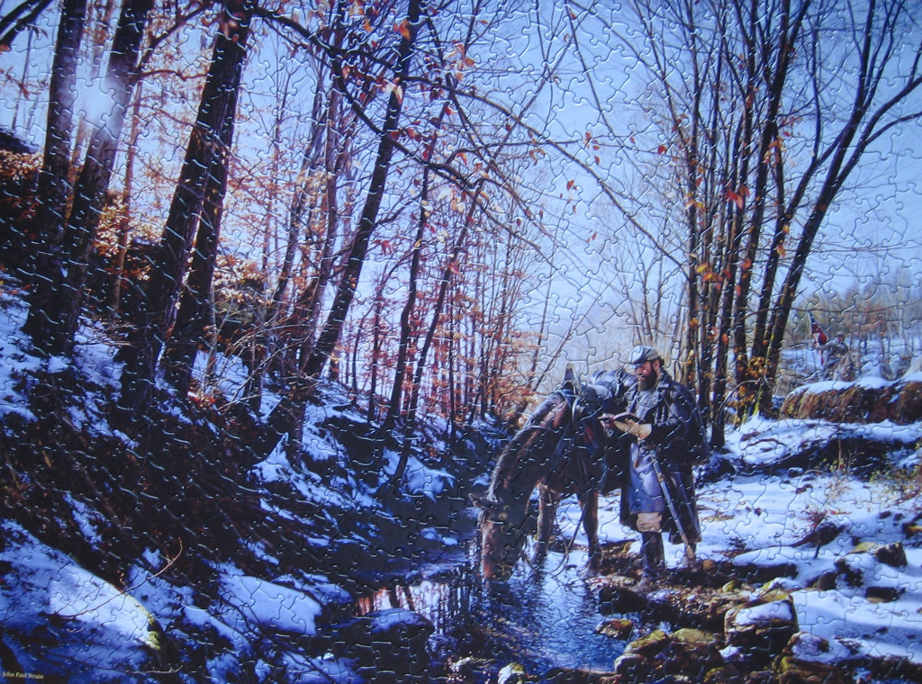 A Civil War-era soldier reading a book beside his horse in a snowy, wooded stream.