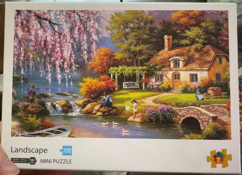 A peaceful country cottage scene by a stream with blooming cherry blossoms, fishermen, and a stone bridge.