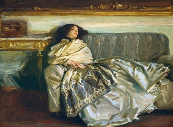 An oil painting of a woman with dark hair resting on a dark sofa, draped in a white patterned shawl.