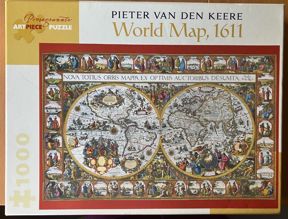 A 1611 world map by Pieter van den Keere featuring two hemispherical projections surrounded by scenes of people and cities.